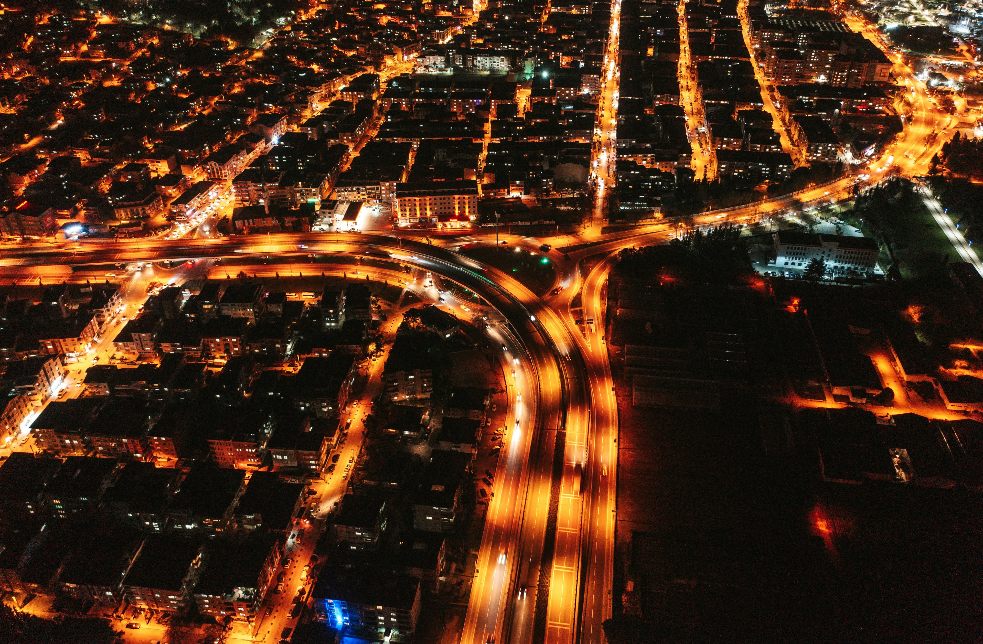 A city and its transport infrastructure illuminated at night
